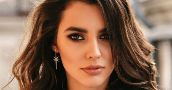 Attractive faces draw our gaze but fail to hijack our peripheral attention