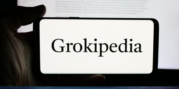 AI-generated Grokipedia articles are longer, less readable, and cite fewer sources than their Wikipedia counterparts